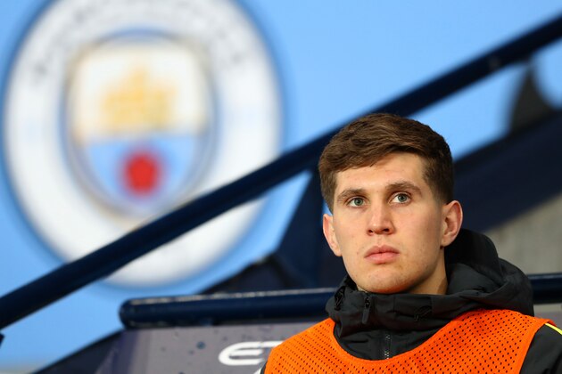 MANCHESTER, ENGLAND - DECEMBER 14: John Stones of Manchester City looks on from the bench during the Premier League match between Manchester City and Watford at Etihad Stadium on December 14, 2016 in Manchester, England.  (Photo by Michael Steele/Getty Images)