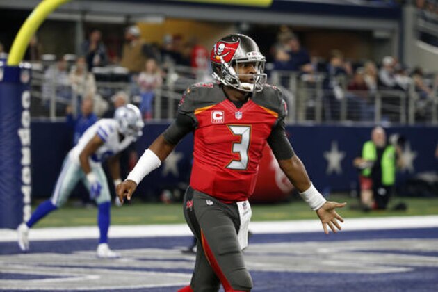 Tampa Bay Buccaneers' Jameis Winston walks off the field to the sideline during an NFL football game against the Dallas Cowboys on Sunday, Dec. 18, 2016, in Arlington, Texas. (AP Photo/Michael Ainsworth)