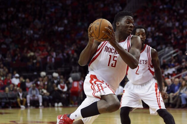 HOUSTON, TX - DECEMBER 05:  Clint Capela #15 of the Houston Rockets drives to the basket Boston Celtics at Toyota Center on December 5, 2016 in Houston, Texas. NOTE TO USER: User expressly acknowledges and agrees that, by downloading and/or using this photograph, user is consenting to the terms and conditions of the Getty Images License Agreement.  (Photo by Bob Levey/Getty Images)