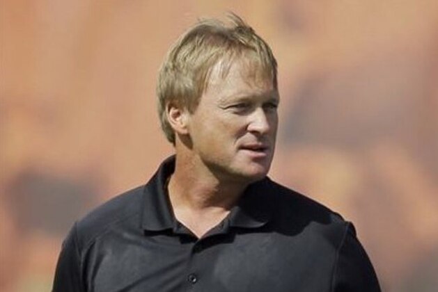 FILE - In this Aug. 15, 2014 file photo, Jon Gruden is shown at the Cleveland Browns training camp in Berea, Ohio. Serena Williams, Jon Gruden, Rob Manfred and Tim Finchem recognize the dangers of underfinanced youth sports across the nation. They are getting together for a star-studded panel discussion as they seek ways to provide funding for all sports for all youngsters. (AP Photo/Mark Duncan, File)
