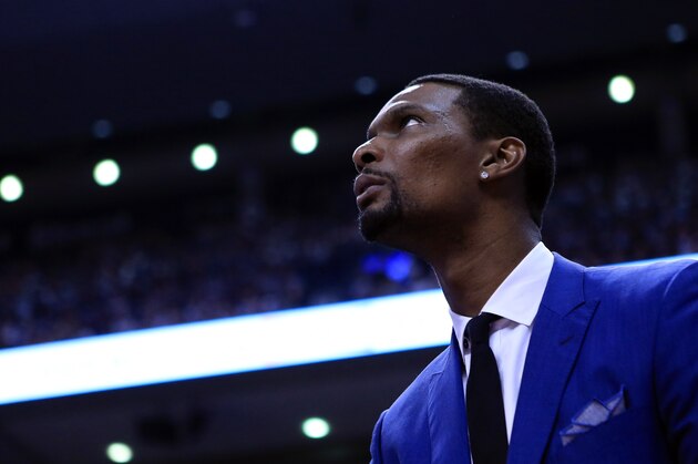 TORONTO, ON - MAY 03:  Chris Bosh #1 of the Miami Heat looks on from the bench in the first half of Game One of the Eastern Conference Semifinals against the Toronto Raptors during the 2016 NBA Playoffs at the Air Canada Centre on May 3, 2016 in Toronto, Ontario, Canada.  NOTE TO USER: User expressly acknowledges and agrees that, by downloading and or using this photograph, User is consenting to the terms and conditions of the Getty Images License Agreement.  (Photo by Vaughn Ridley/Getty Images)