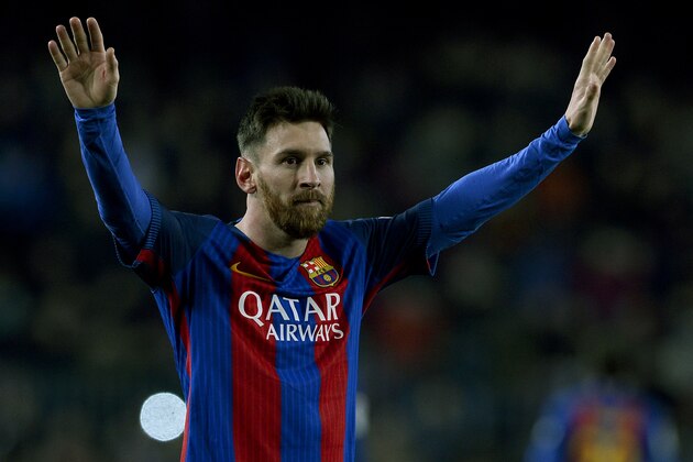 Barcelona's Argentinian forward Lionel Messi celebrates his goal during the Spanish league football match FC Barcelona vs RCD Espanyol at the Camp Nou stadium in Barcelona on December 18, 2016. / AFP / JOSEP LAGO        (Photo credit should read JOSEP LAGO/AFP/Getty Images)