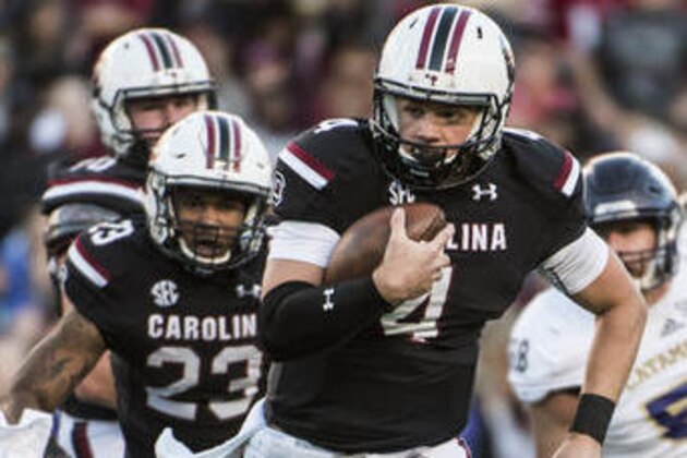 South Carolina quarterback Jake Bentley (4) runs the ball during the first half of an NCAA college football game against Western Carolina on Saturday, Nov. 19, 2016, in Columbia, S.C. South Carolina defeated Western Carolina 44-31. (AP Photo/Sean Rayford)
