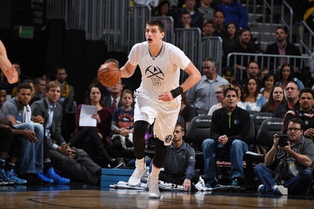 DENVER, CO - DECEMBER 19:  Nikola Jokic #15 of the Denver Nuggets handles the ball against the Dallas Mavericks on December 19, 2016 at the Pepsi Center in Denver, Colorado. NOTE TO USER: User expressly acknowledges and agrees that, by downloading and/or using this Photograph, user is consenting to the terms and conditions of the Getty Images License Agreement. Mandatory Copyright Notice: Copyright 2016 NBAE (Photo by Garrett Ellwood/NBAE via Getty Images)