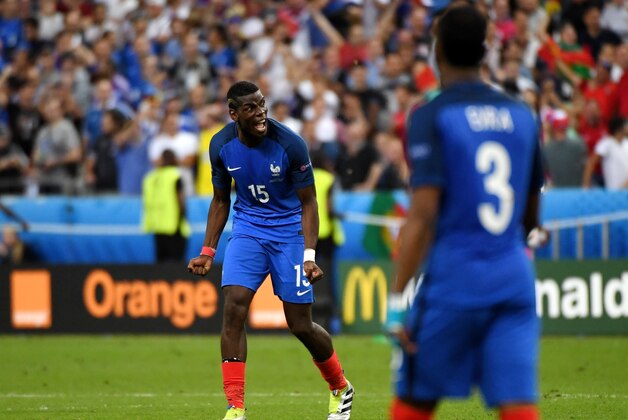 PARIS, FRANCE - JULY 10:  Paul Pogba of France reacts after Portugal's first goal during the UEFA EURO 2016 Final match between Portugal and France at Stade de France on July 10, 2016 in Paris, France.  (Photo by Mike Hewitt/Getty Images)