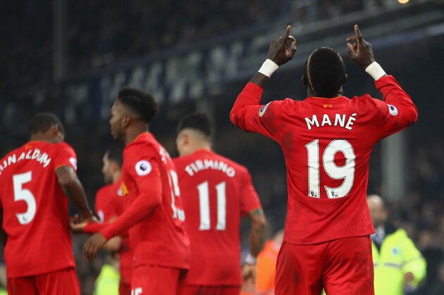 LIVERPOOL, ENGLAND - DECEMBER 19:  Sadio Mane (19) of Liverpool celebrates after scoring the winning goal in injury time during the Premier League match between Everton and Liverpool at Goodison Park on December 19, 2016 in Liverpool, England.  (Photo by Clive Brunskill/Getty Images)