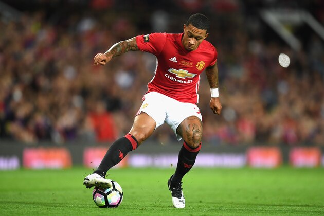 MANCHESTER, ENGLAND - AUGUST 03: Memphis Depay of Manchester United in action during the Wayne Rooney Testimonial match between Manchester United and Everton at Old Trafford on August 3, 2016 in Manchester, England. (Photo by Michael Regan/Getty Images) MANCHESTER, ENGLAND - AUGUST 03: Memphis Depay of Manchester United in action during the Wayne Rooney Testimonial match between Manchester United and Everton at Old Trafford on August 3, 2016 in Manchester, England. (Photo by Michael Regan/Getty Images)
