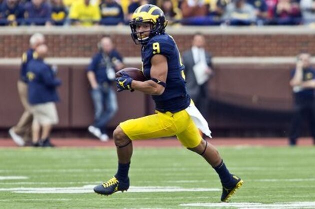 Michigan wide receiver Grant Perry (9) rushes in the second quarter of an NCAA college football game against Wisconsin at Michigan Stadium in Ann Arbor, Mich., Saturday, Oct. 1, 2016. Michigan won 14-7. (AP Photo/Tony Ding)
