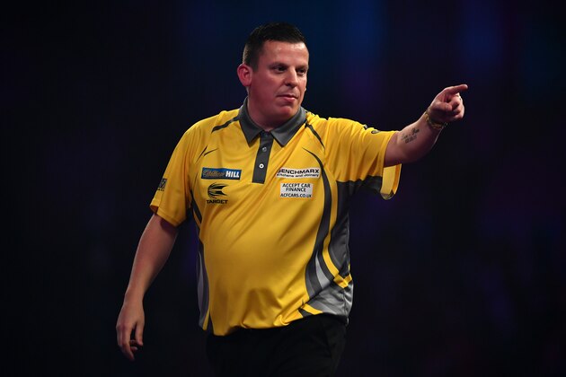 LONDON, ENGLAND - DECEMBER 22:  Dave Chisnall of England reacts during his first round match against Rowby-John Rodriguez of Austria on day eight of the 2017 William Hill PDC World Darts Championships at Alexandra Palace on December 22, 2016 in London, England. (Photo by Dan Mullan/Getty Images)