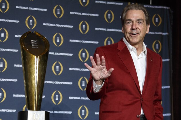 SCOTTSDALE, AZ - JANUARY 12: Head Coach Nick Saban of the Alabama Crimson Tide pose with the College Football Playoff National Championship Trophy during the MVP Press Conference after winning the College Football Playoff National Championship at the JW Marriott Camelback Inn on January 12, 2016 in Scottsdale, Arizona. (Photo by Don Juan Moore/Getty Images)