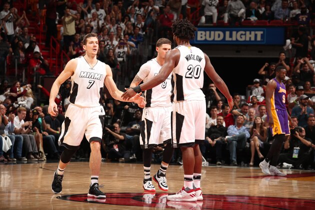 MIAMI, FL - DECEMBER 22:  Goran Dragic #7 and Justise Winslow #20 of the Miami Heat celebrate during a game against the Los Angeles Lakers on December 22, 2016 at American Airlines Arena in Miami, Florida. NOTE TO USER: User expressly acknowledges and agrees that, by downloading and/or using this photograph, user is consenting to the terms and conditions of the Getty Images License Agreement. Mandatory Copyright Notice: Copyright 2016 NBAE (Photo by Issac Baldizon/NBAE via Getty Images)