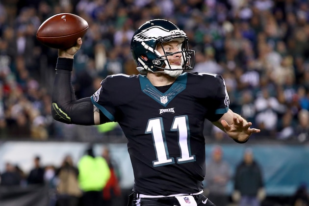 PHILADELPHIA, PA - DECEMBER 22:  Quarterback Carson Wentz #11 of the Philadelphia Eagles throws a pass against the New York Giants during the second quarter of the game at Lincoln Financial Field on December 22, 2016 in Philadelphia, Pennsylvania.  (Photo by Al Bello/Getty Images)