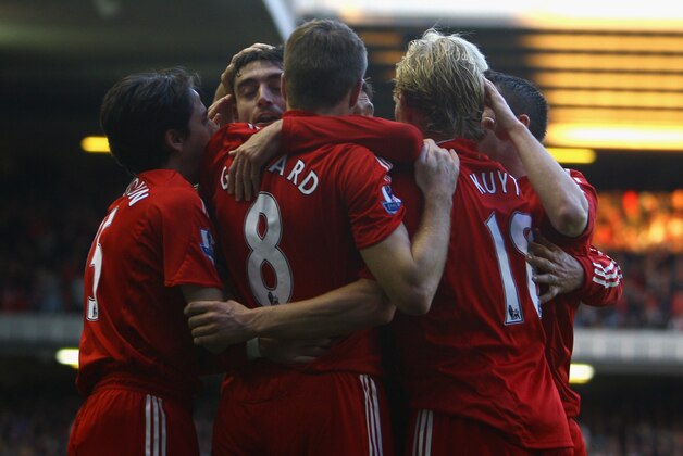 LIVERPOOL, UNITED KINGDOM - DECEMBER 26:  Albert Riera of Liverpool celebrates scoring the opening goal with his team mates during the Barclays Premier League match between Liverpool and Bolton Wanderers at Anfield on December 26, 2008 in Liverpool, England.  (Photo by Julian Finney/Getty Images)