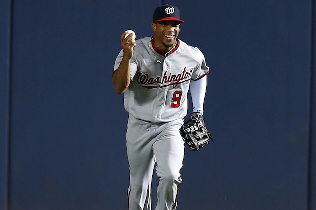 ATLANTA, GA - AUGUST 19:  Centerfielder Ben Revere #9 of the Washington Nationals celebrates after catching a ball hit by first baseman Freddie Freeman #5 of the Atlanta Braves (not pictured) to save a home run in the fourth inning during the game at Turner Field on August 19, 2016 in Atlanta, Georgia.  (Photo by Mike Zarrilli/Getty Images)
