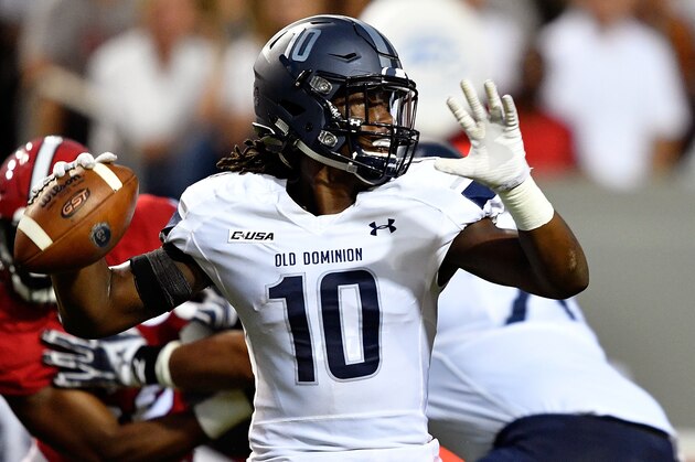 RALEIGH, NC - SEPTEMBER 17: David Washington #10 of the Old Dominion Monarchs attempts a pass against the NC State Wolfpack at Carter-Finley Stadium on September 17, 2016 in Raleigh, North Carolina. (Photo by Mike Comer/Getty Images)