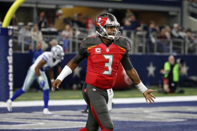 Tampa Bay Buccaneers' Jameis Winston walks off the field to the sideline during an NFL football game against the Dallas Cowboys on Sunday, Dec. 18, 2016, in Arlington, Texas. (AP Photo/Michael Ainsworth)