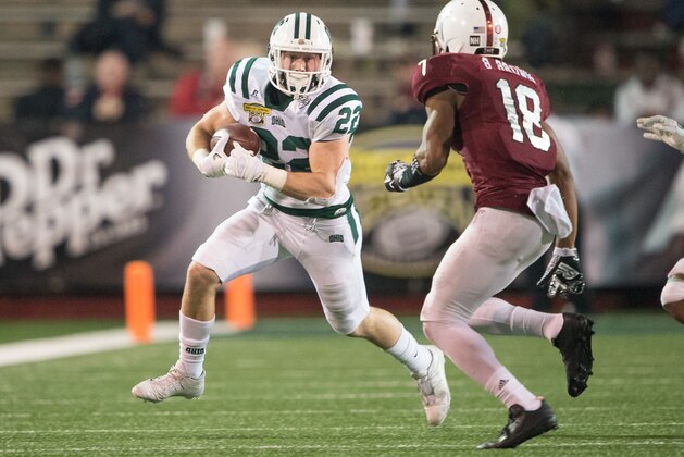 MOBILE, AL - DECEMBER 23: Wide reciever Heath Wiseman #22 of the Ohio Bobcats safety looks to maneuver by cornerback Blace Brown #18 of the Troy Trojans on December 23, 2016 in Mobile, Alabama. The Troy Trojans defeated the Ohio Bobcats 28-23. (Photo by Michael Chang/Getty Images)