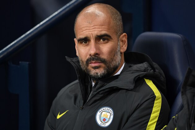Manchester City's Spanish manager Pep Guardiola looks on ahead of the English Premier League football match between Manchester City and Arsenal at the Etihad Stadium in Manchester, north west England, on December 18, 2016. / AFP / Paul ELLIS / RESTRICTED TO EDITORIAL USE. No use with unauthorized audio, video, data, fixture lists, club/league logos or 'live' services. Online in-match use limited to 75 images, no video emulation. No use in betting, games or single club/league/player publications.  /         (Photo credit should read PAUL ELLIS/AFP/Getty Images)
