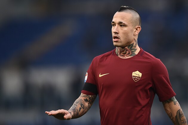 Roma's midfielder from Belgium Radja Nainggolan looks on during the Italian Serie A football match SS Lazio vs AS Roma on December 4, 2016 at the Olympic stadium in Rome.  / AFP / FILIPPO MONTEFORTE        (Photo credit should read FILIPPO MONTEFORTE/AFP/Getty Images)