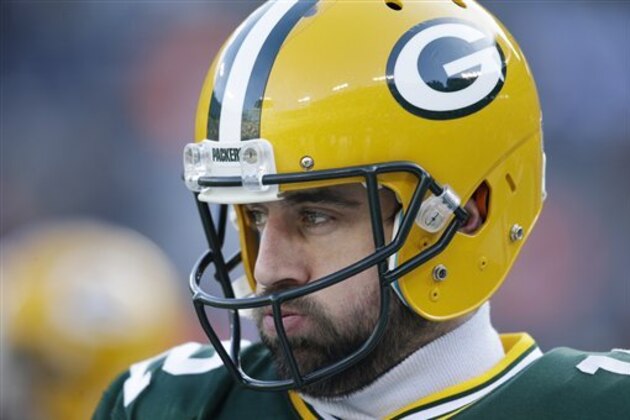 Green Bay Packers' Aaron Rodgers warms up before an NFL football game against the Minnesota Vikings Saturday, Dec. 24, 2016, in Green Bay, Wis. (AP Photo/Jeffrey Phelps)