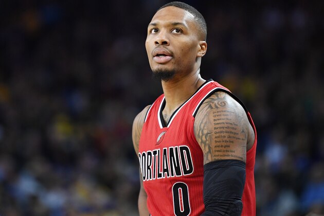 OAKLAND, CA - DECEMBER 17:  Damian Lillard #0 of the Portland Trail Blazers looks on against the Golden State Warriors during an NBA Basketbball game at ORACLE Arena on December 17, 2016 in Oakland, California. NOTE TO USER: User expressly acknowledges and agrees that, by downloading and or using this photograph, User is consenting to the terms and conditions of the Getty Images License Agreement.  (Photo by Thearon W. Henderson/Getty Images)