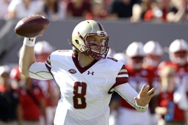 Boston College quarterback Patrick Towles (8) looks to pass against North Carolina State during the first half of an NCAA college football game in Raleigh, N.C., Saturday, Oct. 29, 2016. (AP Photo/Gerry Broome)
