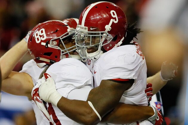 ATLANTA, GA - DECEMBER 03:  Bo Scarbrough #9 of the Alabama Crimson Tide celebrates his third quarter touchdown against the Florida Gators with teammates during the SEC Championship game at the Georgia Dome on December 3, 2016 in Atlanta, Georgia.  (Photo by Kevin C. Cox/Getty Images)