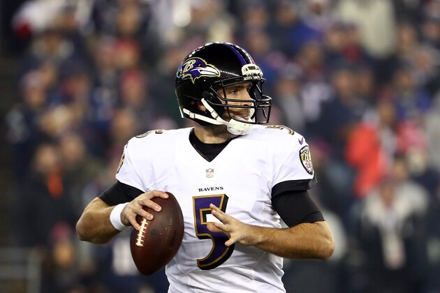 FOXBORO, MA - DECEMBER 12:  Joe Flacco #5 of the Baltimore Ravens looks to pass during the first half against the New England Patriots at Gillette Stadium on December 12, 2016 in Foxboro, Massachusetts.  (Photo by Adam Glanzman/Getty Images)