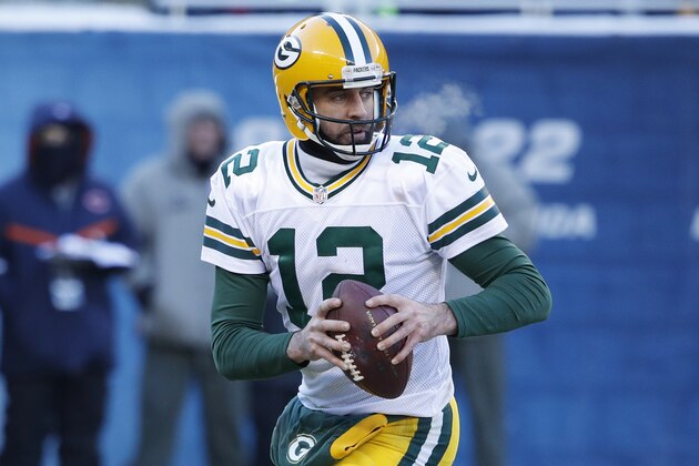 CHICAGO, IL - DECEMBER 18: Aaron Rodgers #12 of the Green Bay Packers looks to pass against the Chicago Bears during the game at Soldier Field on December 18, 2016 in Chicago, Illinois. The Packers defeated the Bears 30-27. (Photo by Joe Robbins/Getty Images)