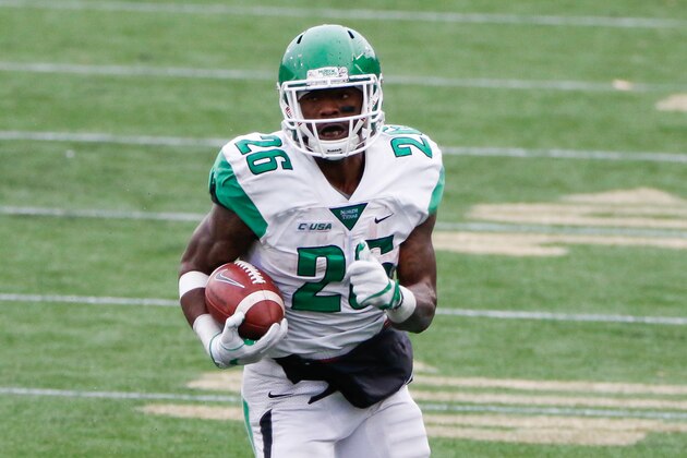 WEST POINT, NY - OCTOBER 22: Running back Jeffrey Wilson #26 of the North Texas Mean Green runs with the ball during second half action against the Army Black Knights at Michie Stadium on October 22, 2016 in West Point, New York. North Texas defeated Army 35-18. (Photo by Charles Norfleet/Getty Images)