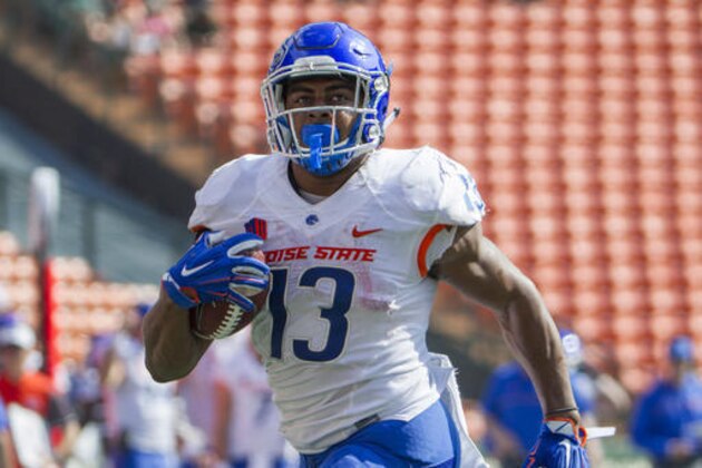 Boise State running back Jeremy McNichols (13) runs in for a touchdown in the first half of an NCAA college football game against Hawaii, Saturday, Nov. 12, 2016, in Honolulu. (AP Photo/Eugene Tanner)
