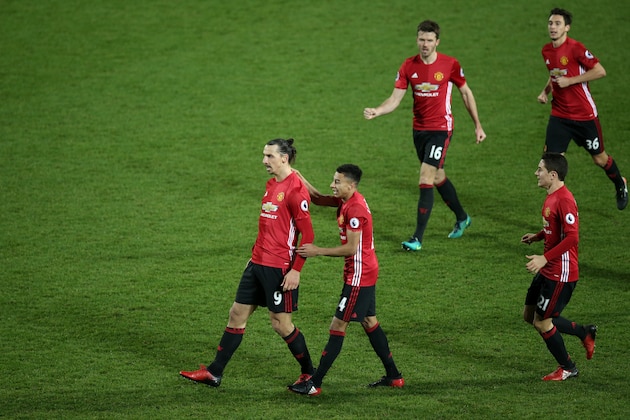 WEST BROMWICH, ENGLAND - DECEMBER 17:  Zlatan Ibrahimovic of Manchester United celebrates scoring the first goal with Jesse Lingard to make the score 0-2 during the Premier League match between West Bromwich Albion and Manchester United at The Hawthorns on December 17, 2016 in West Bromwich, England.  (Photo by Robbie Jay Barratt - AMA/Getty Images)