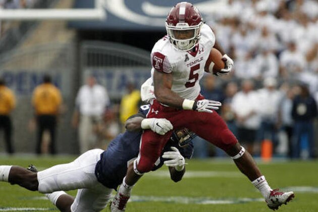 Temple's Jahad Thomas (5) gets to the outside as Penn State's Malik Golden (6) takes him down during the first half of an NCAA college football game in State College, Pa., Saturday, Sept. 17, 2016. (AP Photo/Chris Knight)