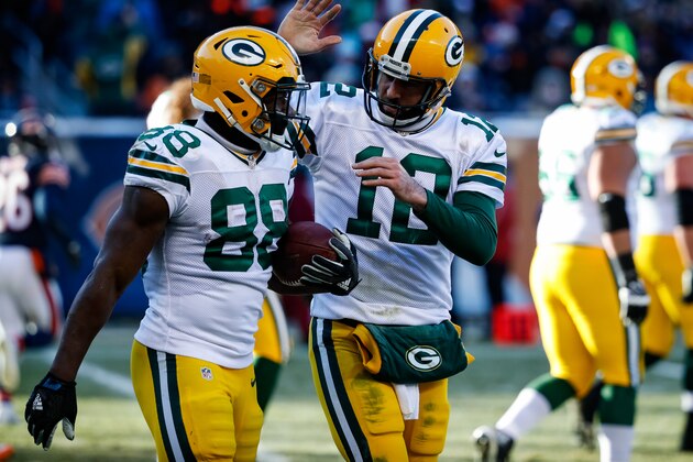 CHICAGO, IL - DECEMBER 18:  Ty Montgomery #88 of the Green Bay Packers celebrates with quarterback Aaron Rodgers #12 after scoring a touchdown against the Chicago Bears in the third quarter at Soldier Field on December 18, 2016 in Chicago, Illinois.  (Photo by Joe Robbins/Getty Images)