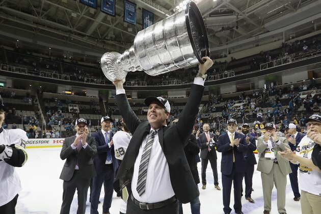 SAN JOSE, CA - JUNE 12:  Head coach Mike Sullivan of the Pittsburgh Penguins celebrates with the Stanley Cup after their 3-1 victory to win the Stanley Cup against the San Jose Sharks in Game Six of the 2016 NHL Stanley Cup Final at SAP Center on June 12, 2016 in San Jose, California.  (Photo by Bruce Bennett/Getty Images)