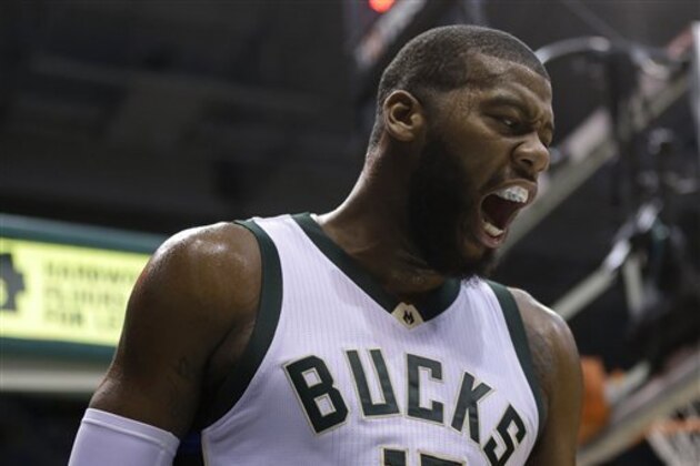Milwaukee Bucks' Greg Monroe reacts during an NBA basketball game against the Brooklyn Nets Saturday, Dec. 3, 2016, in Milwaukee. (AP Photo/Aaron Gash)