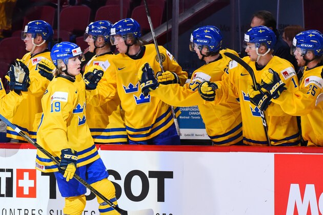 MONTREAL, QC - DECEMBER 26:  Alexander Nylander #19 of Team Sweden celebrates his first period goal during the IIHF preliminary round game against Team Denmark at the Bell Centre on December 26, 2016 in Montreal, Quebec, Canada.  (Photo by Minas Panagiotakis/Getty Images)