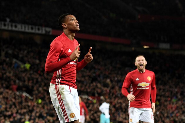 MANCHESTER, ENGLAND - NOVEMBER 30:  Anthony Martial of Manchester United celebrates after scoring his team's third goal of the game during the EFL Cup quarter final match between Manchester United and West Ham United at Old Trafford on November 30, 2016 in Manchester, England.  (Photo by Shaun Botterill/Getty Images)