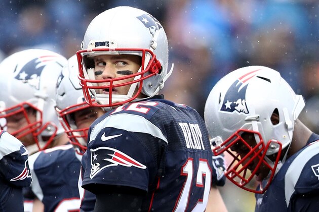 FOXBORO, MA - DECEMBER 24: Tom Brady #12 of the New England Patriots looks on from the huddle during the first half against the New York Jets at Gillette Stadium on December 24, 2016 in Foxboro, Massachusetts. (Photo by Maddie Meyer/Getty Images)