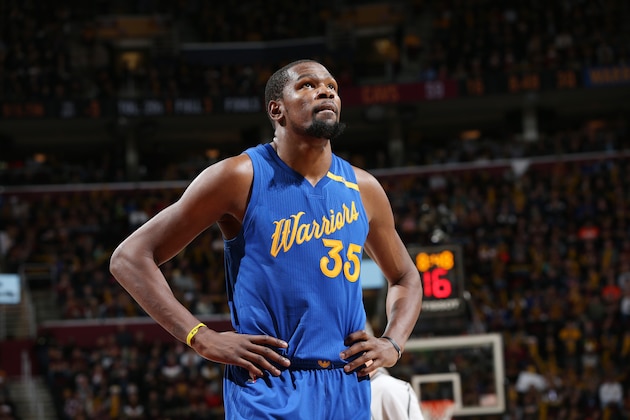 CLEVELAND, OH - DECEMBER 25:  Kevin Durant #35 of the Golden State Warriors reacts to a play against the Cleveland Cavaliers during the game on December 25, 2016 at Quicken Loans Arena in Cleveland, Ohio. NOTE TO USER: User expressly acknowledges and agrees that, by downloading and/or using this Photograph, user is consenting to the terms and conditions of the Getty Images License Agreement. Mandatory Copyright Notice: Copyright 2016 NBAE  (Photo by David Sherman/NBAE via Getty Images)