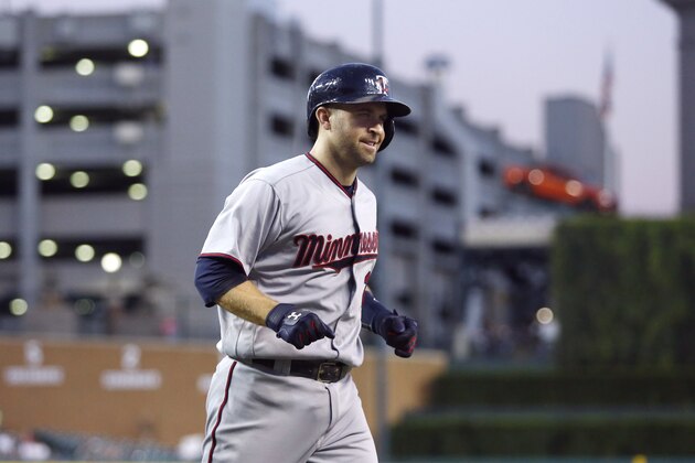 DETROIT, MI - SEPTEMBER 12:  Brian Dozier #2 of the Minnesota Twins smiles as he approaches the dugout after hitting his 40th home run during the third inning at Comerica Park on September 12, 2016 in Detroit, Michigan. (Photo by Duane Burleson/Getty Images)