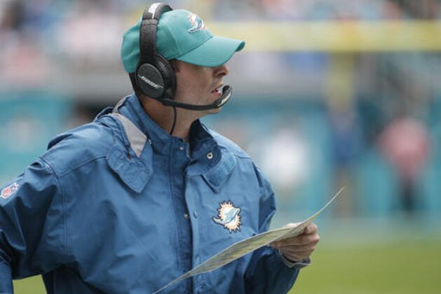 Miami Dolphins head coach Adam Gase watches the game, during the first half of an NFL football game against the Arizona Cardinals, Sunday, Dec. 11, 2016, in Miami Gardens, Fla. (AP Photo/Wilfredo Lee)