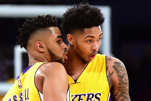 LOS ANGELES, CA - OCTOBER 26:  D'Angelo Russell #1 of the Los Angeles Lakers speaks with Brandon Ingram #14 of the Los Angeles Lakers who's playing in his first NBA game against the Houston Rockets at Staples Center on October 26, 2016 in Los Angeles, California.  NOTE TO USER: User expressly acknowledges and agrees that, by downloading and or using this photograph, User is consenting to the terms and conditions of the Getty Images License Agreement.  (Photo by Harry How/Getty Images)