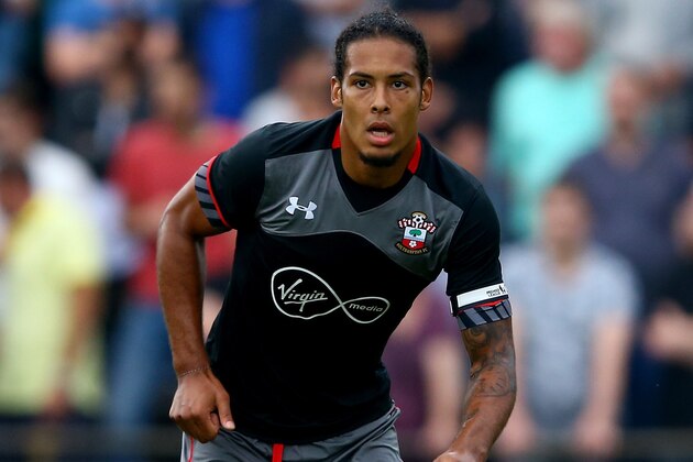 OLDENZAAL, NETHERLANDS - JULY 27:  Virgil van Dijk of Southampton runs with the ball  during the friendly match between Twente Enschede and FC Southampton at Q20 Stadium on July 27, 2016 in Oldenzaal, Netherlands.  (Photo by Christof Koepsel/Getty Images)