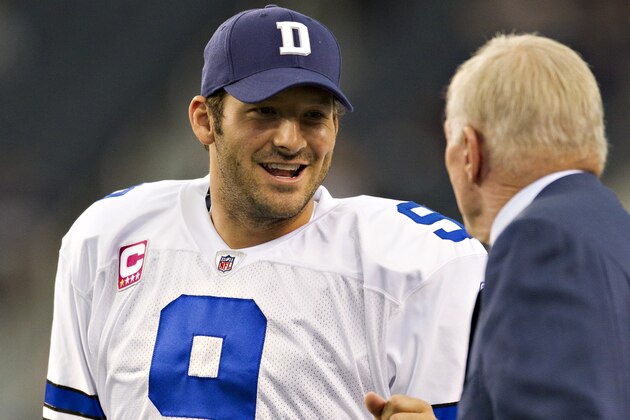 ARLINGTON, TX - OCTOBER 23:   Quarterback Tony Romo #9 bumps fist with Owner Jerry Jones of the Dallas Cowboys before a game against the St. Louis Rams at the Cowboy Stadium on October 23, 2011 in Arlington, Texas.  The Cowboys defeated the Rams 34 to 7.  (Photo by Wesley Hitt/Getty Images)