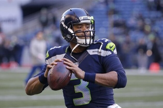 Seattle Seahawks quarterback Russell Wilson warms-up before an NFL football game against the Arizona Cardinals, Saturday, Dec. 24, 2016, in Seattle. (AP Photo/Ted S. Warren)