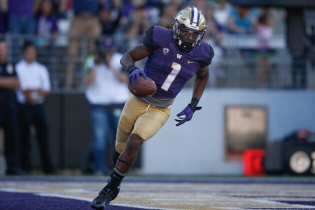 SEATTLE, WA - SEPTEMBER 10:  Wide receiver John Ross #1 of the Washington Huskies scores a touchdown  against the Idaho Vandals in the third quarter on September 10, 2016 at Husky Stadium in Seattle, Washington.  (Photo by Otto Greule Jr/Getty Images)