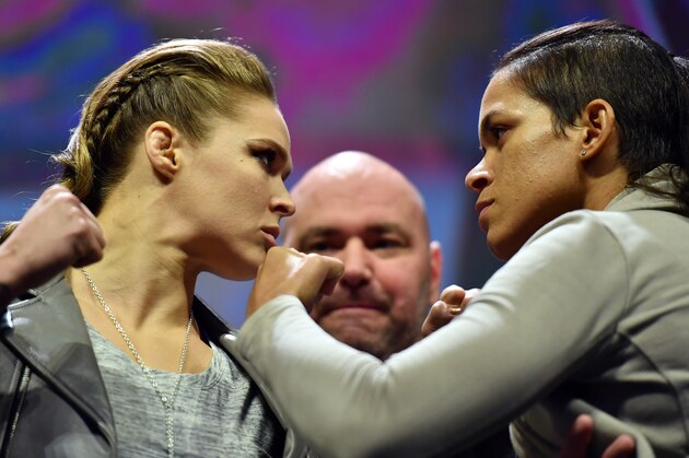 NEW YORK, NY - NOVEMBER 11:  UFC 207 opponents Ronda Rousey (L) and Amanda Nunes (R) face off after the UFC 205 weigh-in inside Madison Square Garden on November 11, 2016 in New York City. (Photo by Brandon Magnus/Zuffa LLC/Zuffa LLC via Getty Images)