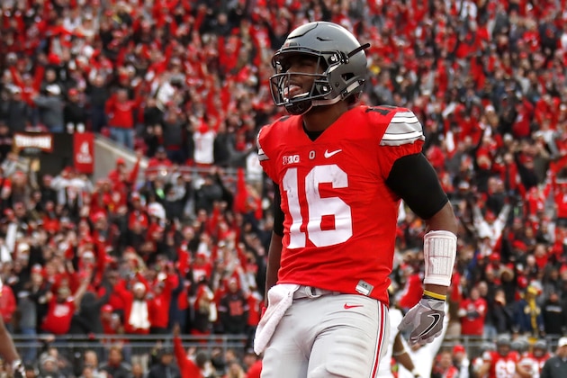 COLUMBUS, OH - NOVEMBER 26:   J.T. Barrett #16 of the Ohio State Buckeyes celebrates after rushing for a touchdown in overtime against the Michigan Wolverines at Ohio Stadium on November 26, 2016 in Columbus, Ohio.  (Photo by Gregory Shamus/Getty Images)
