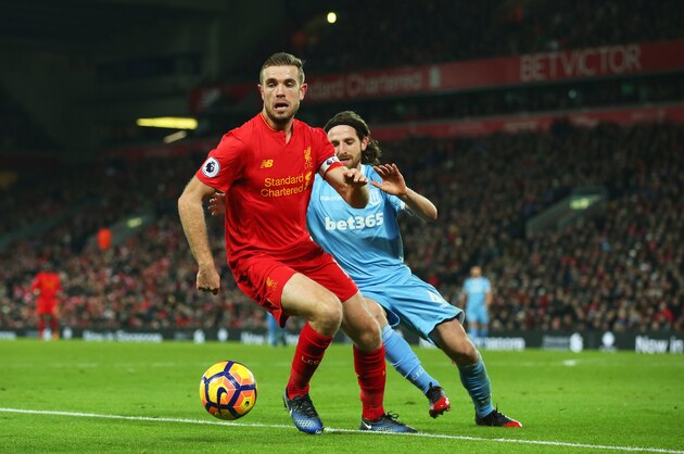 LIVERPOOL, ENGLAND - DECEMBER 27:  Jordan Henderson of Liverpool holds off Joe Allen of Stoke City during the Premier League match between Liverpool and Stoke City at Anfield on December 27, 2016 in Liverpool, England.  (Photo by Alex Livesey/Getty Images)